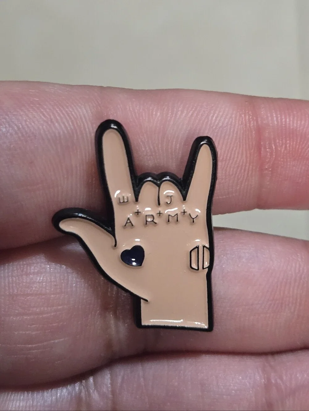 BTS ARMY Hand Enamel Pin in Nude with Black Outline